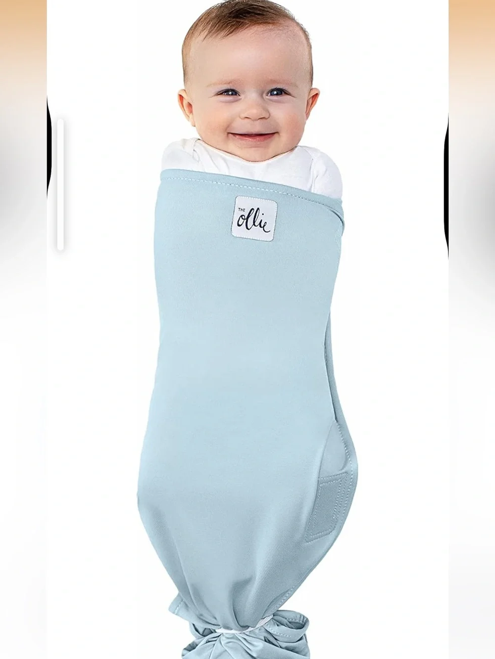 The Ollie Adjustable Swaddle For Newborns. Color: Sky. NEW IN OPEN BOX